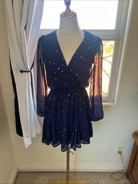 Francesca’s Navy Star Print Wrap Romper